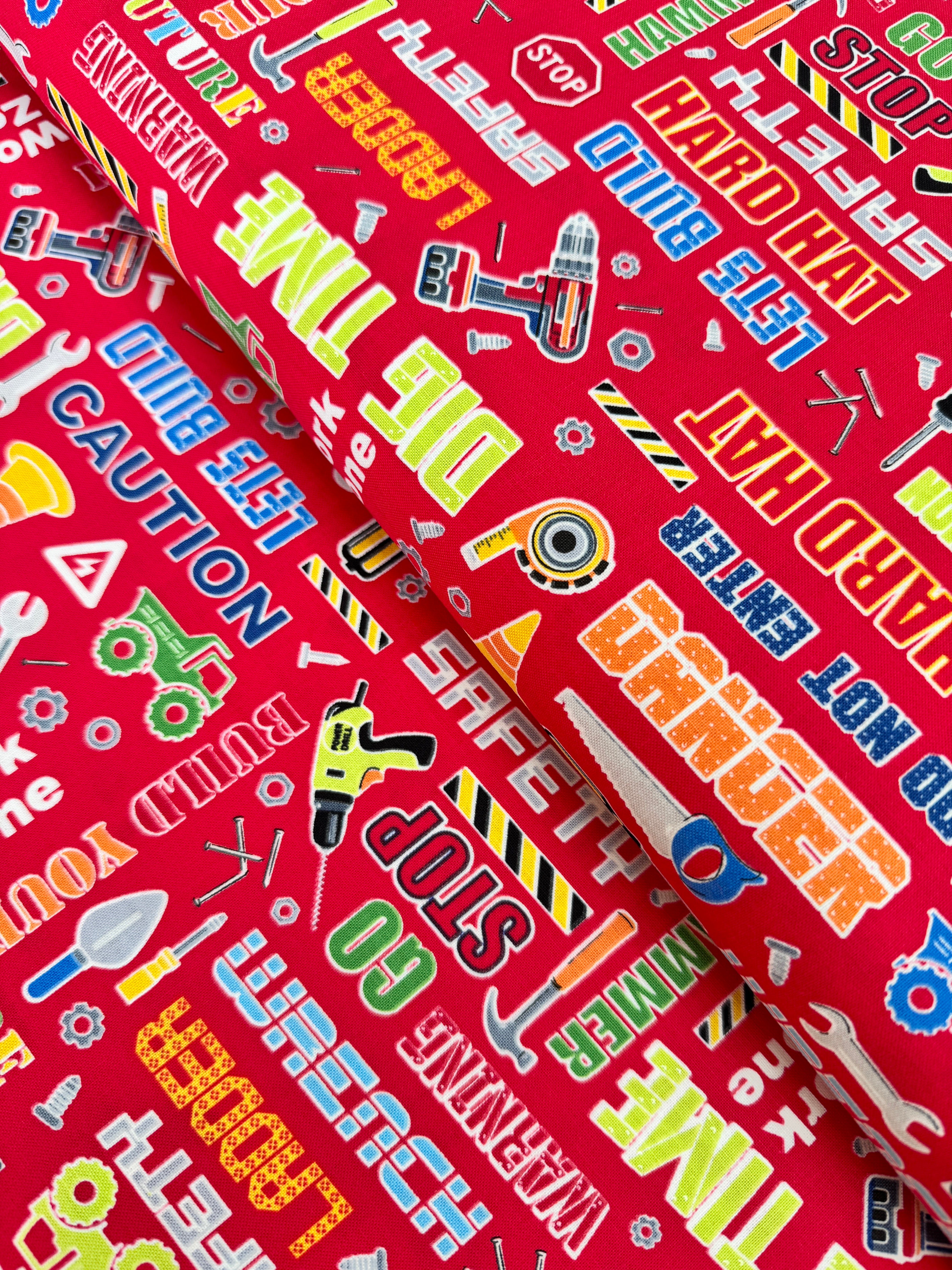 Construction Crew Glow in the Dark Red Fabric by Kanvas Studio for Benartex