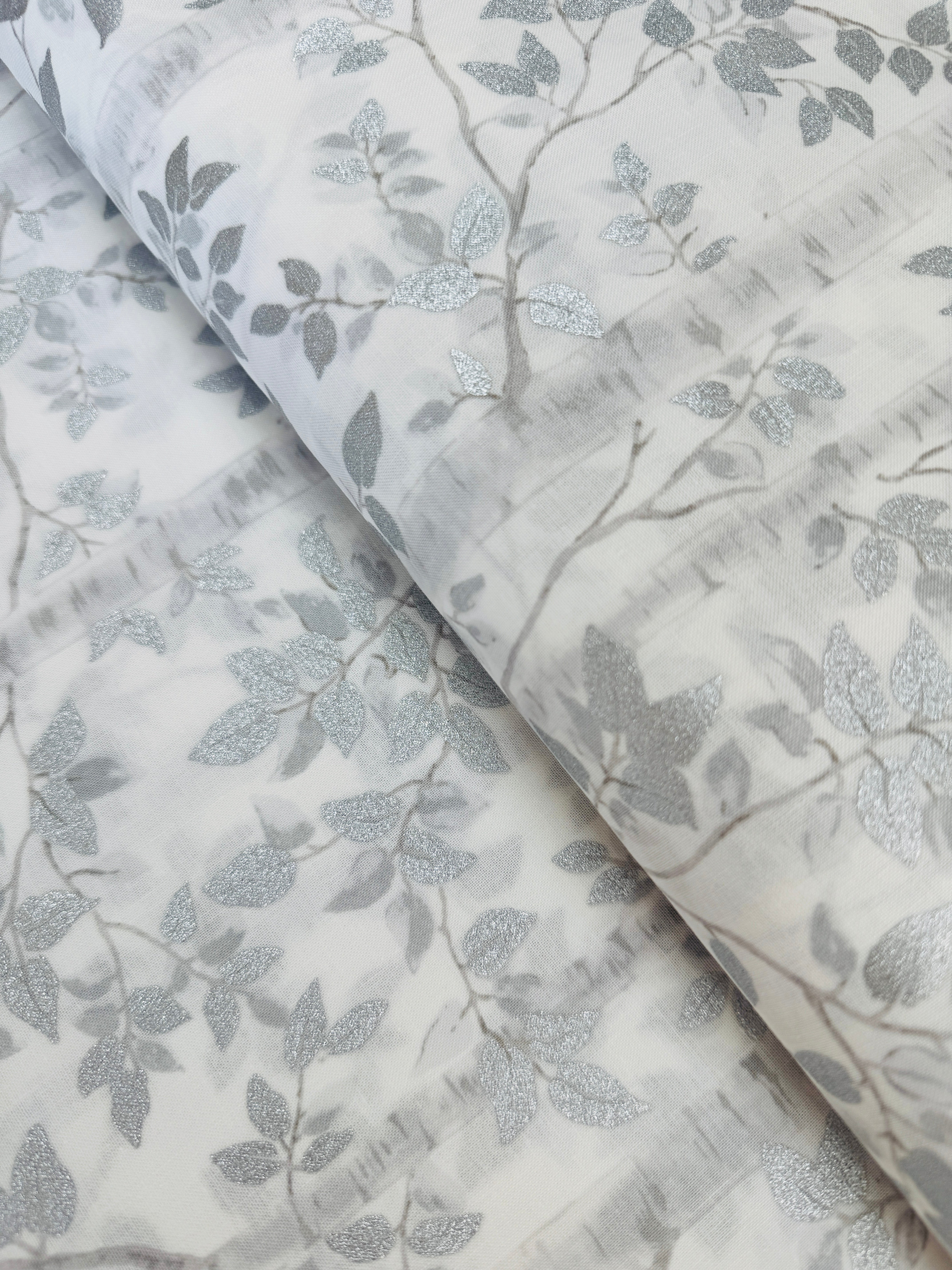 First Snowfall fabric with silver metallic leaves on white background by Hoffman Fabrics – quilting and holiday cotton.