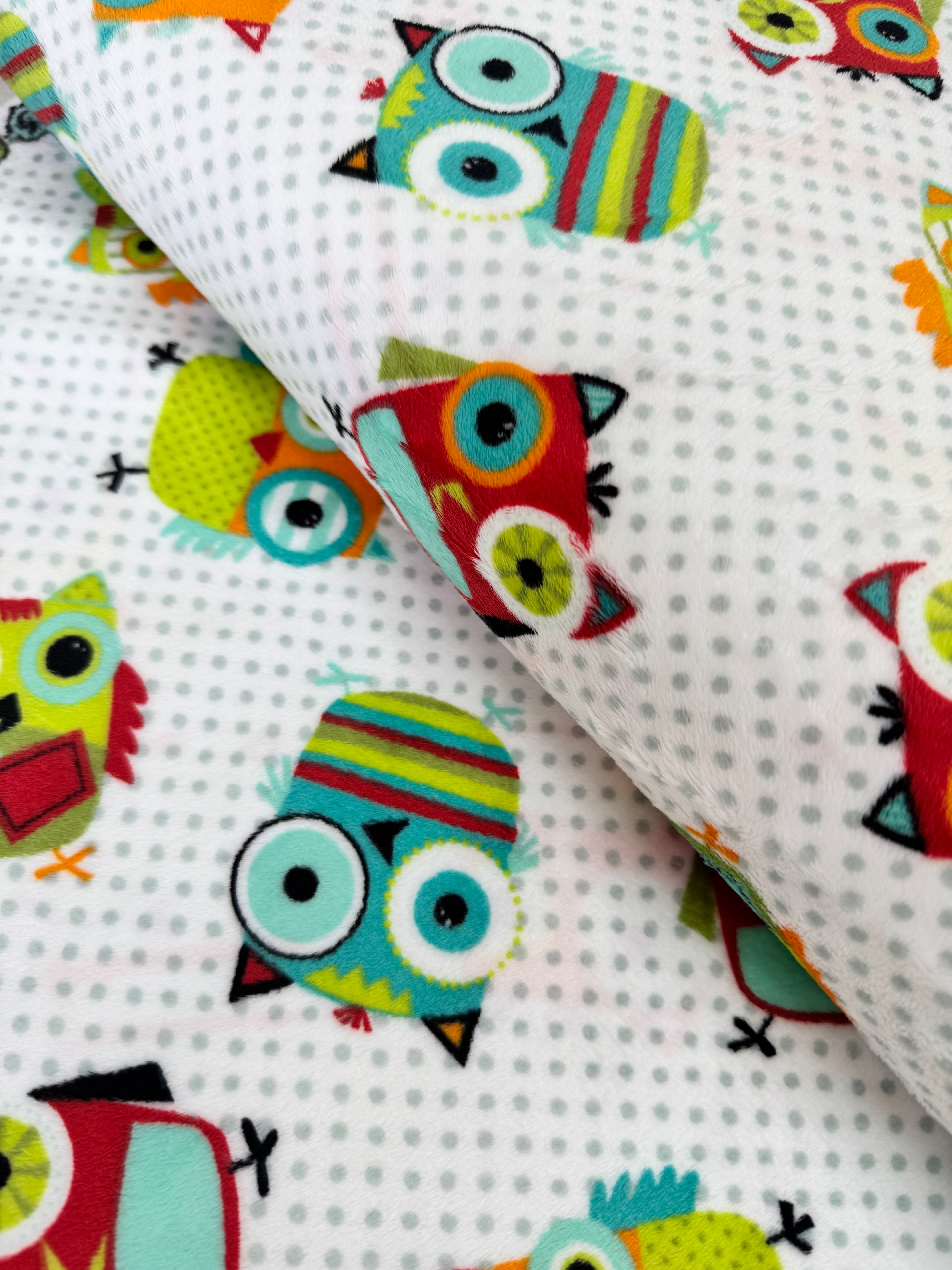 Hooty Cuddle Snow minky fabric by Shannon Fabrics with whimsical owls on snowy white background.