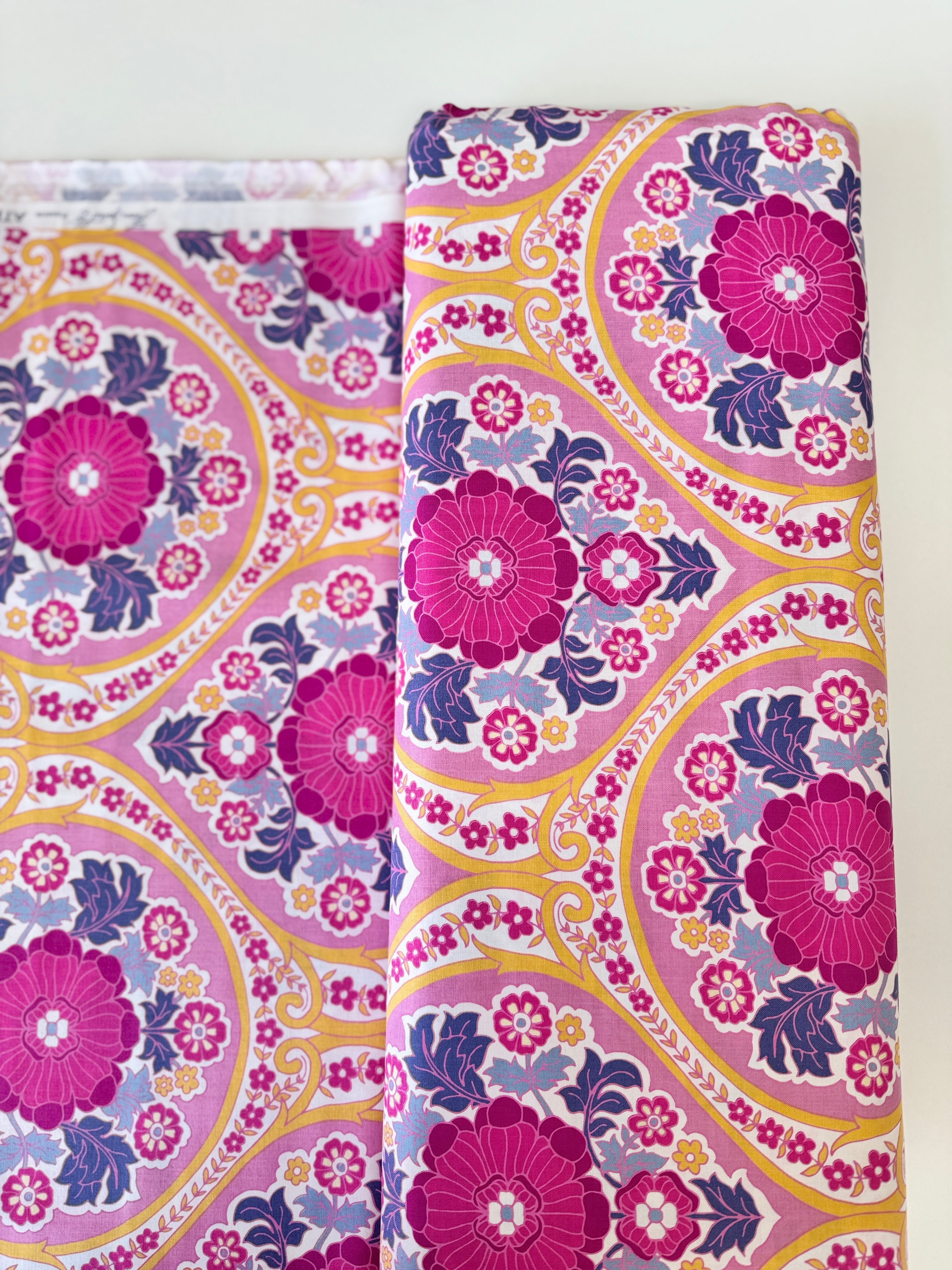 Atrium – Grace Fuchsia fabric by Joel Dewberry for FreeSpirit featuring a modern floral medallion print in vibrant fuchsia tones.