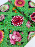 Kaffe Fassett Collective Vintage Flower Lattice Jewel fabric by Philip Jacobs for Free Spirit Fabrics featuring bold pink and green floral pattern on black background.