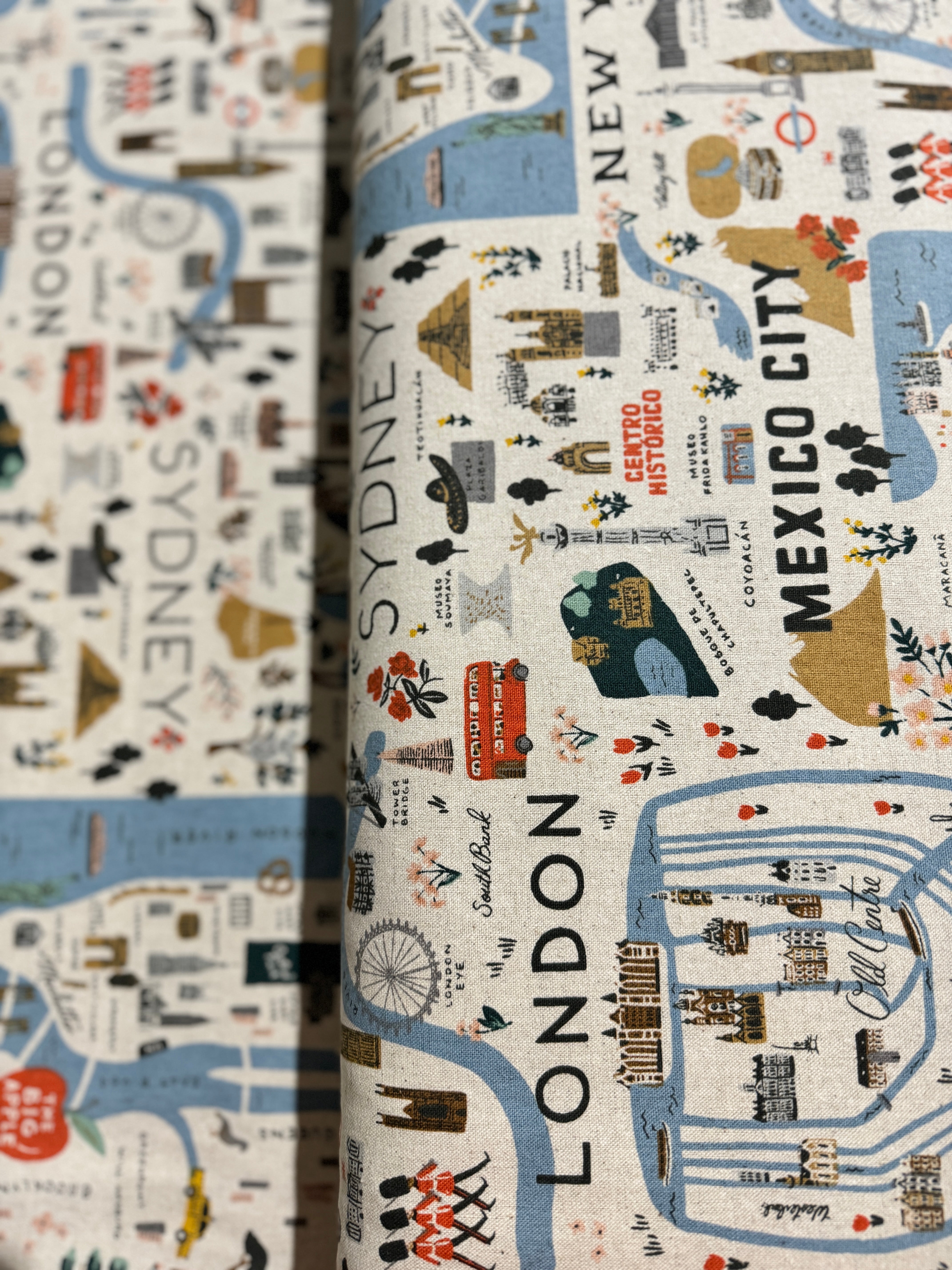 Bon Voyage City Guide Natural Canvas fabric by Rifle Paper Co. for Cotton + Steel – travel map and icons on unbleached cotton/linen.