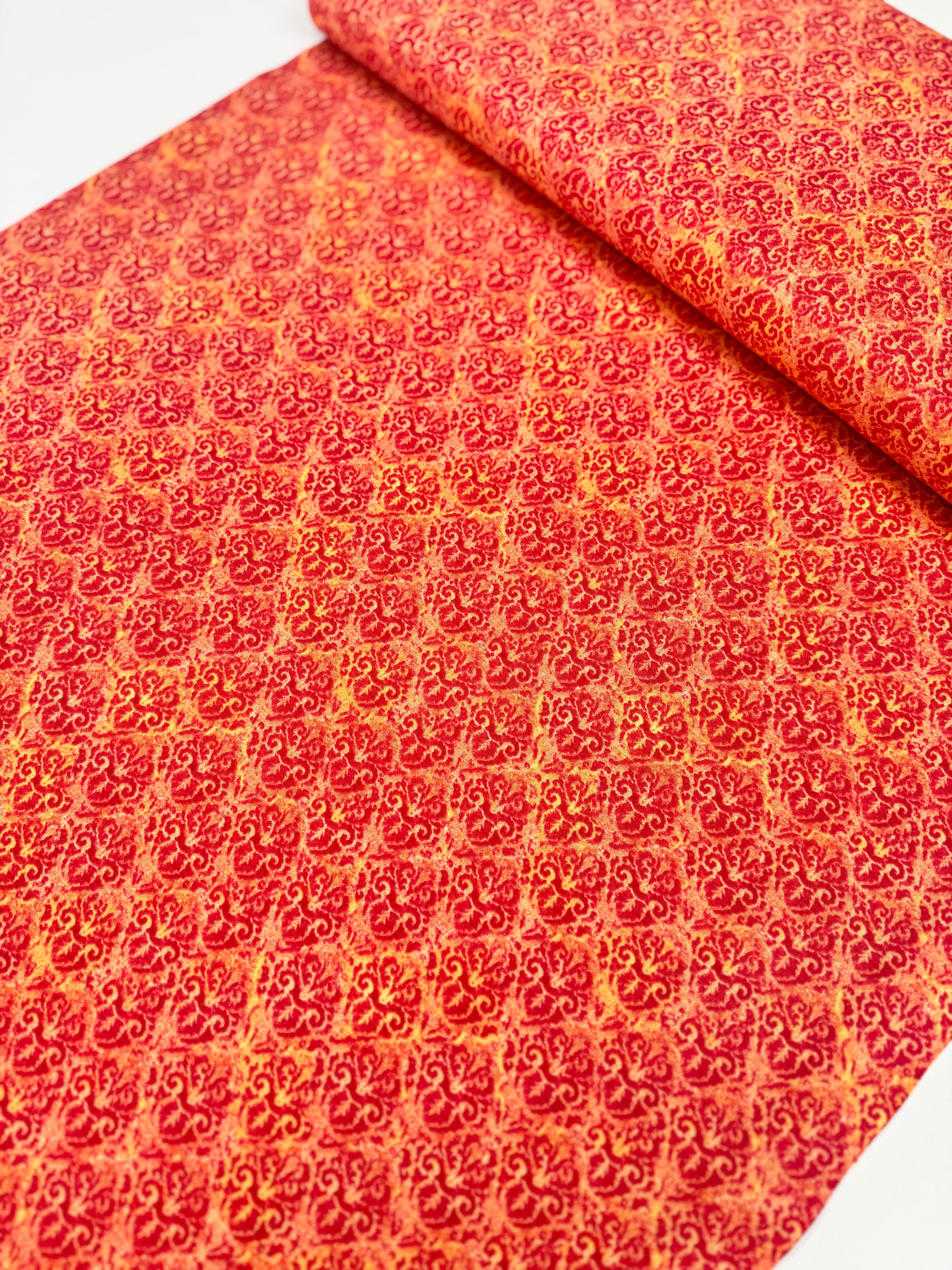 Blossom & Bloom Nouveau Damask Orange Fabric by John Christopher for Wilmington Prints featuring elegant orange damask motifs on a peach background.