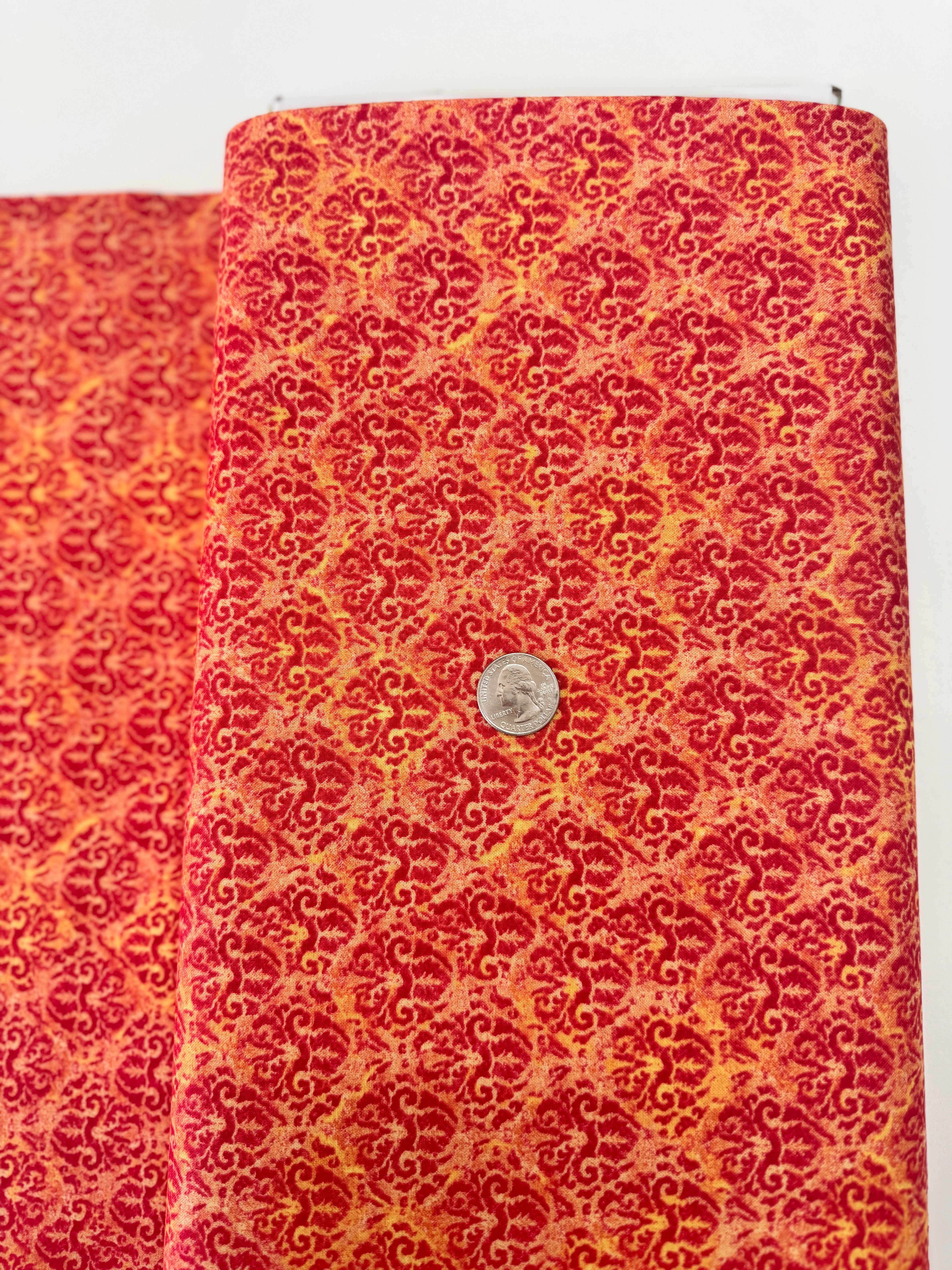 Blossom & Bloom Nouveau Damask Orange Fabric by John Christopher for Wilmington Prints featuring elegant orange damask motifs on a peach background.