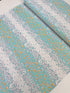Atrium - Hexapoint Mint Fabric by Joel Dewberry for Free Spirit Fabrics featuring mint, gray, and yellow hexagonal geometric pattern on white background.