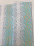 Atrium - Hexapoint Mint Fabric by Joel Dewberry for Free Spirit Fabrics featuring mint, gray, and yellow hexagonal geometric pattern on white background.