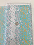 Atrium - Hexapoint Mint Fabric by Joel Dewberry for Free Spirit Fabrics featuring mint, gray, and yellow hexagonal geometric pattern on white background.