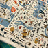 Bon Voyage City Guide Natural Canvas fabric by Rifle Paper Co. for Cotton + Steel – travel map and icons on unbleached cotton/linen.