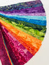 Assorted rainbow batik fabric strips fanned out, featuring 21 colorful 2-inch strips by Kathy Engle for Island Batik.