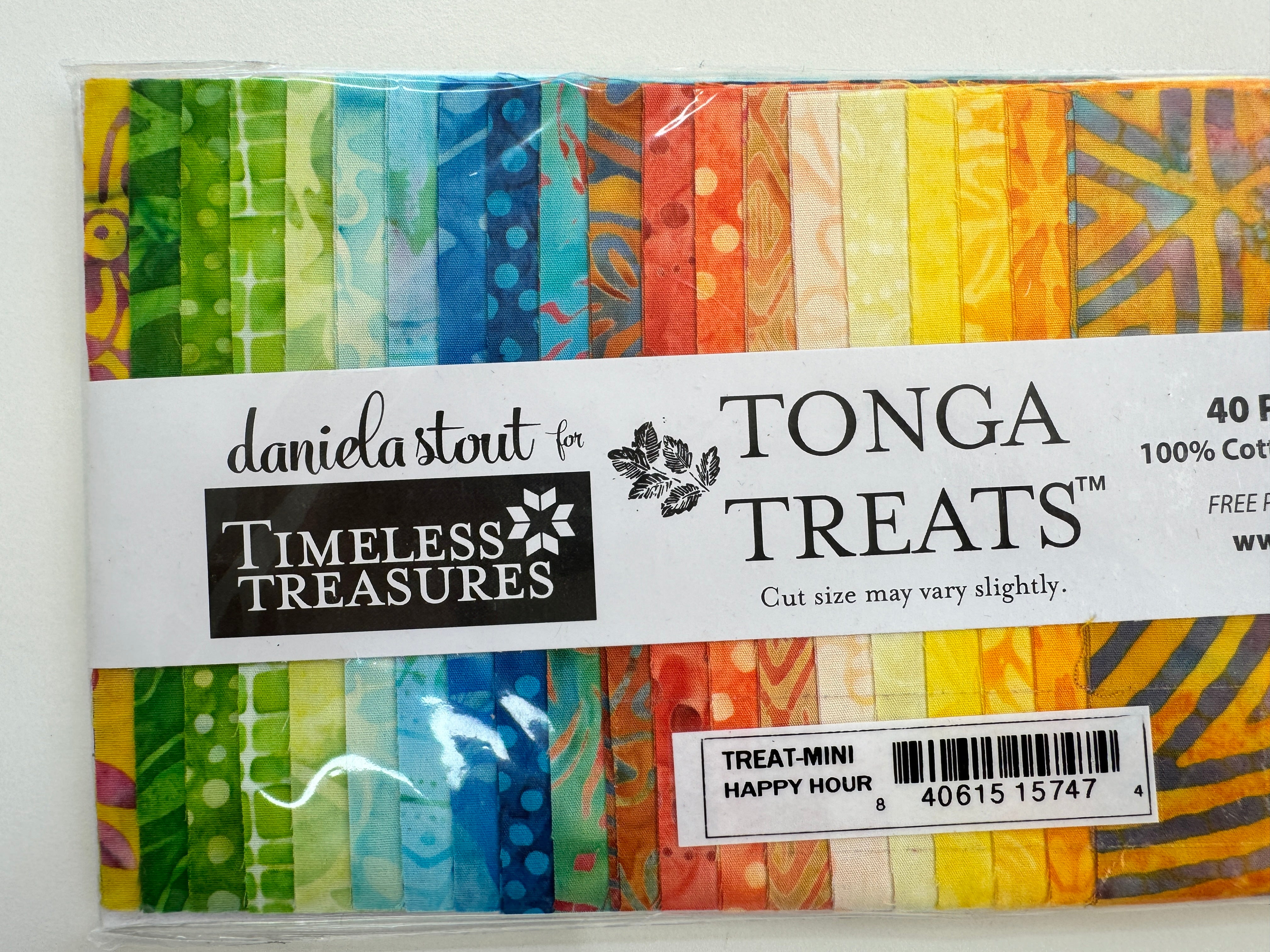 Tonga Treats Happy Hour batik charm pack with 40 coordinating 5 inch precut fabric squares