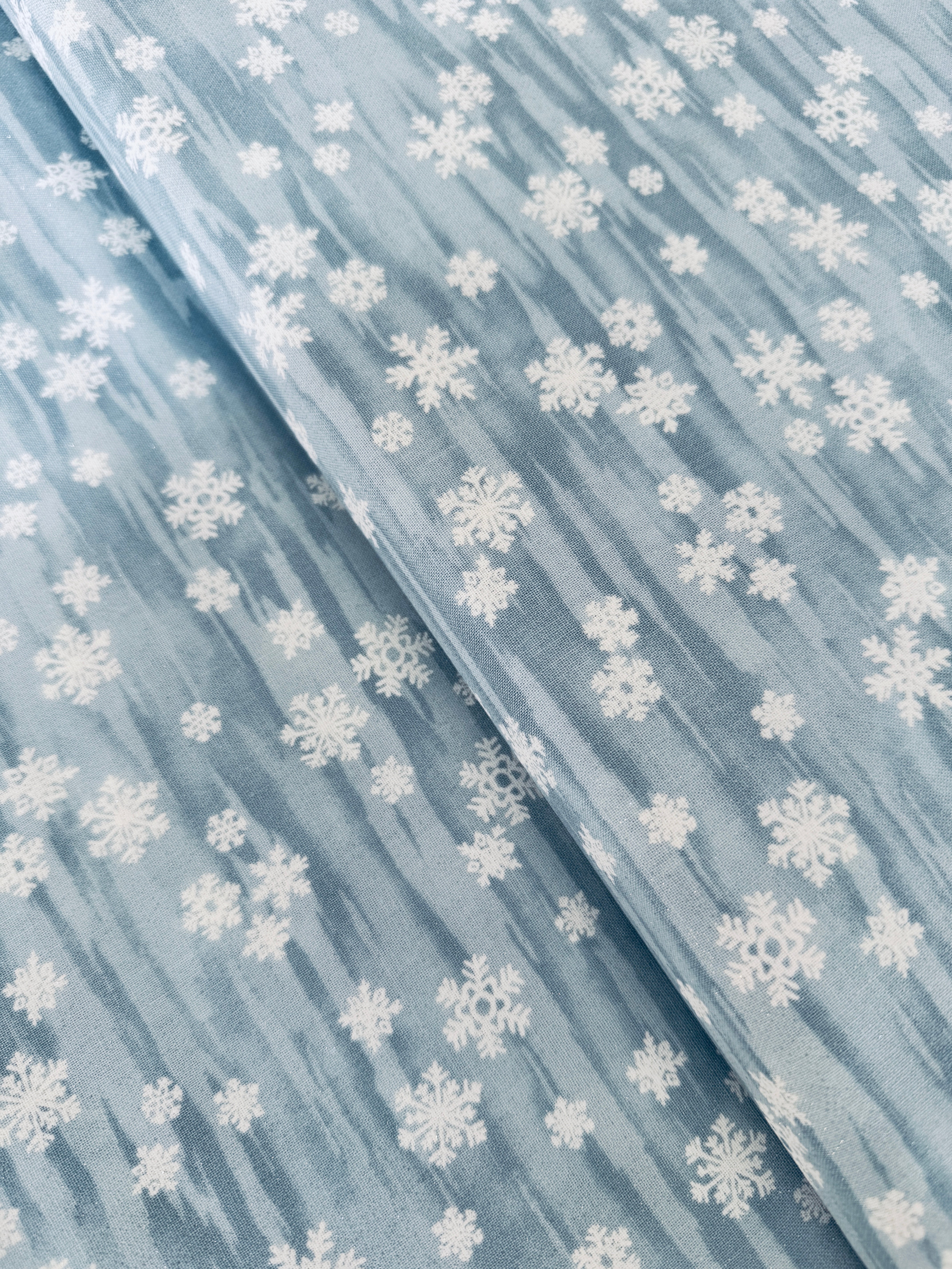 Forest Frost metallic snowflakes fabric in frosty blue by Moda Fabrics