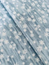 Forest Frost metallic snowflakes fabric in frosty blue by Moda Fabrics
