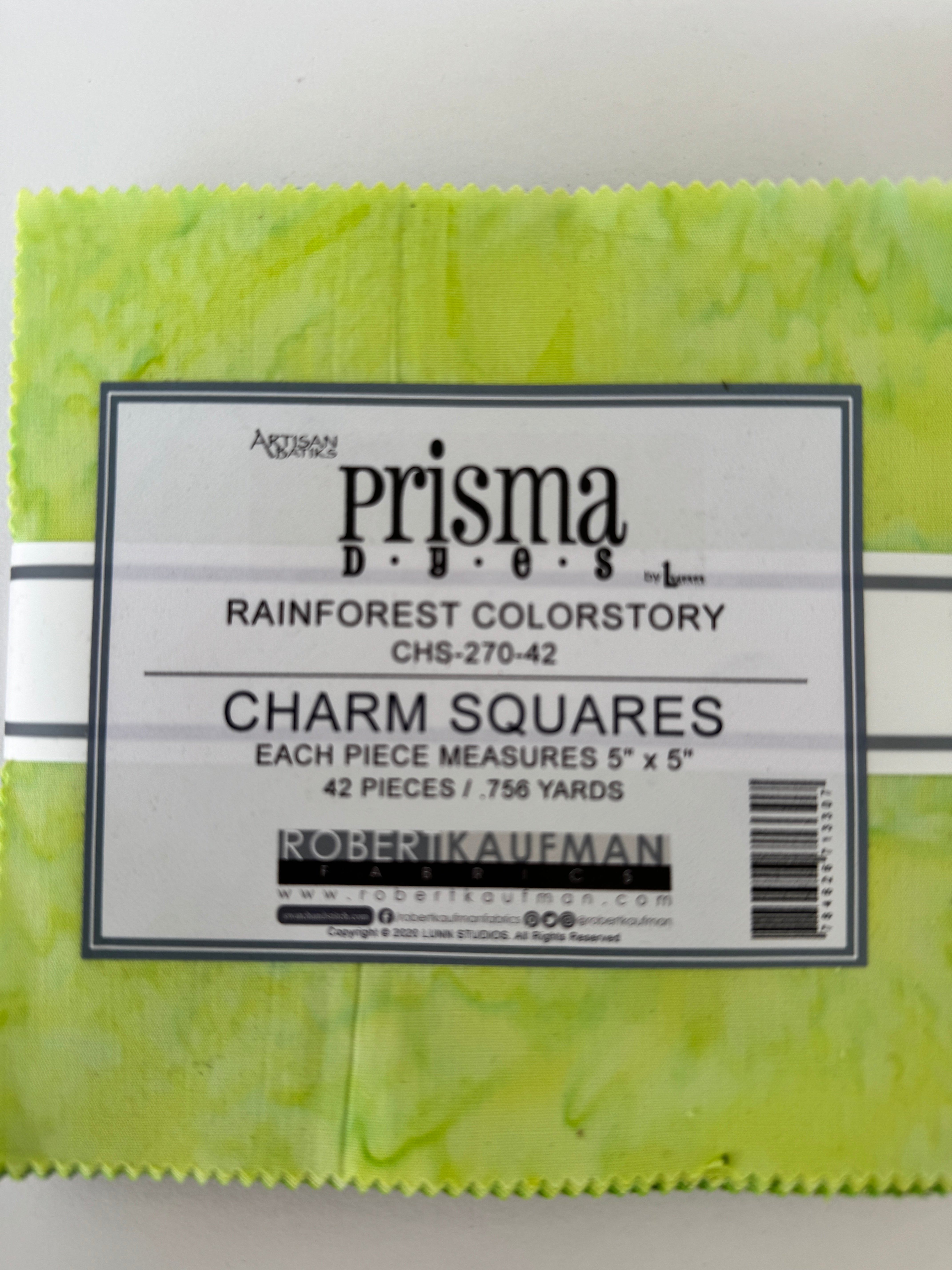 Rainforest Prisma Dyes charm pack featuring hand-dyed green 5-inch batik squares by Robert Kaufman.