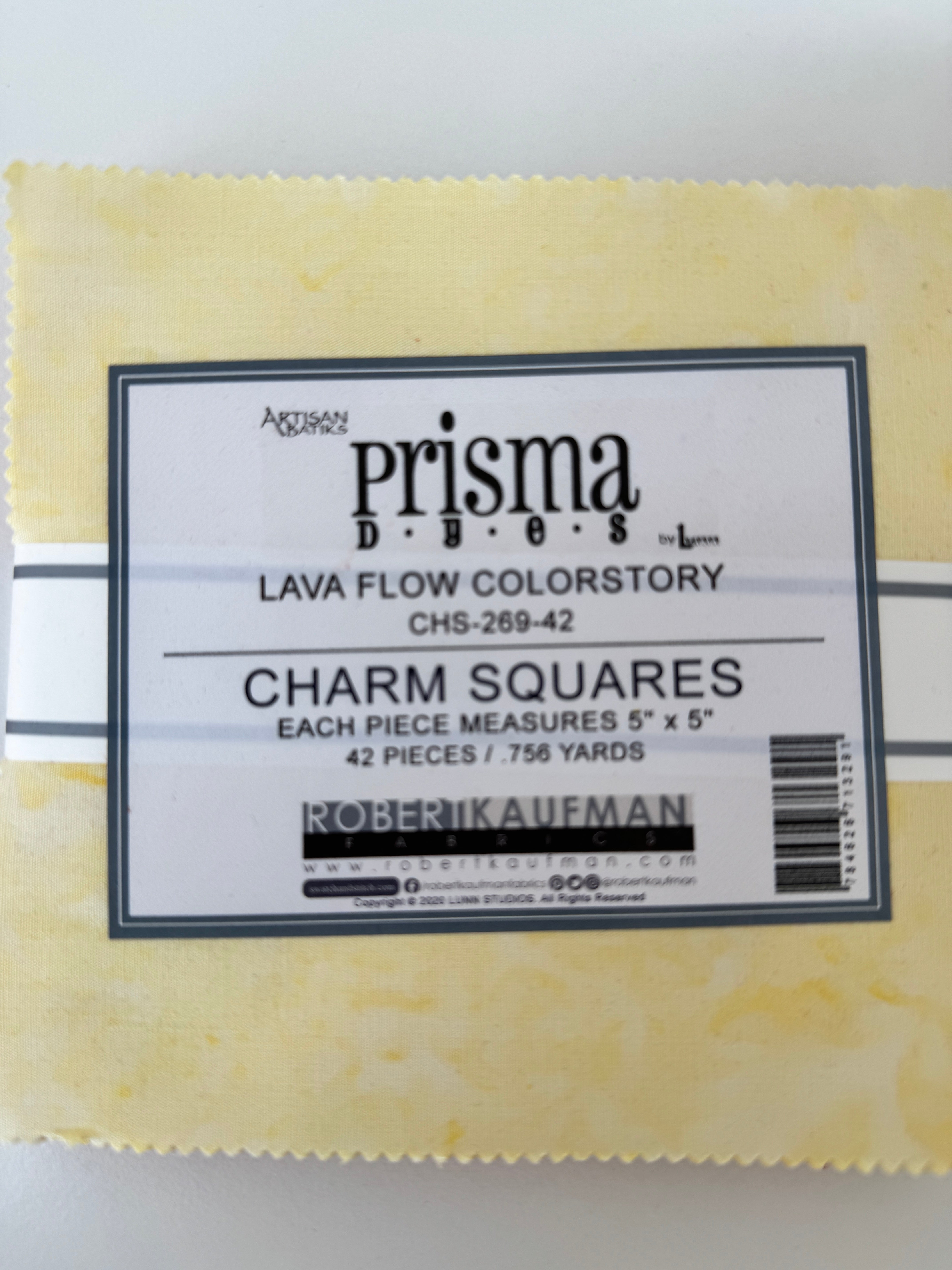 Prisma Dyes Lava Flow charm pack by Robert Kaufman showing 5" batik squares in soft yellow tonal colors.