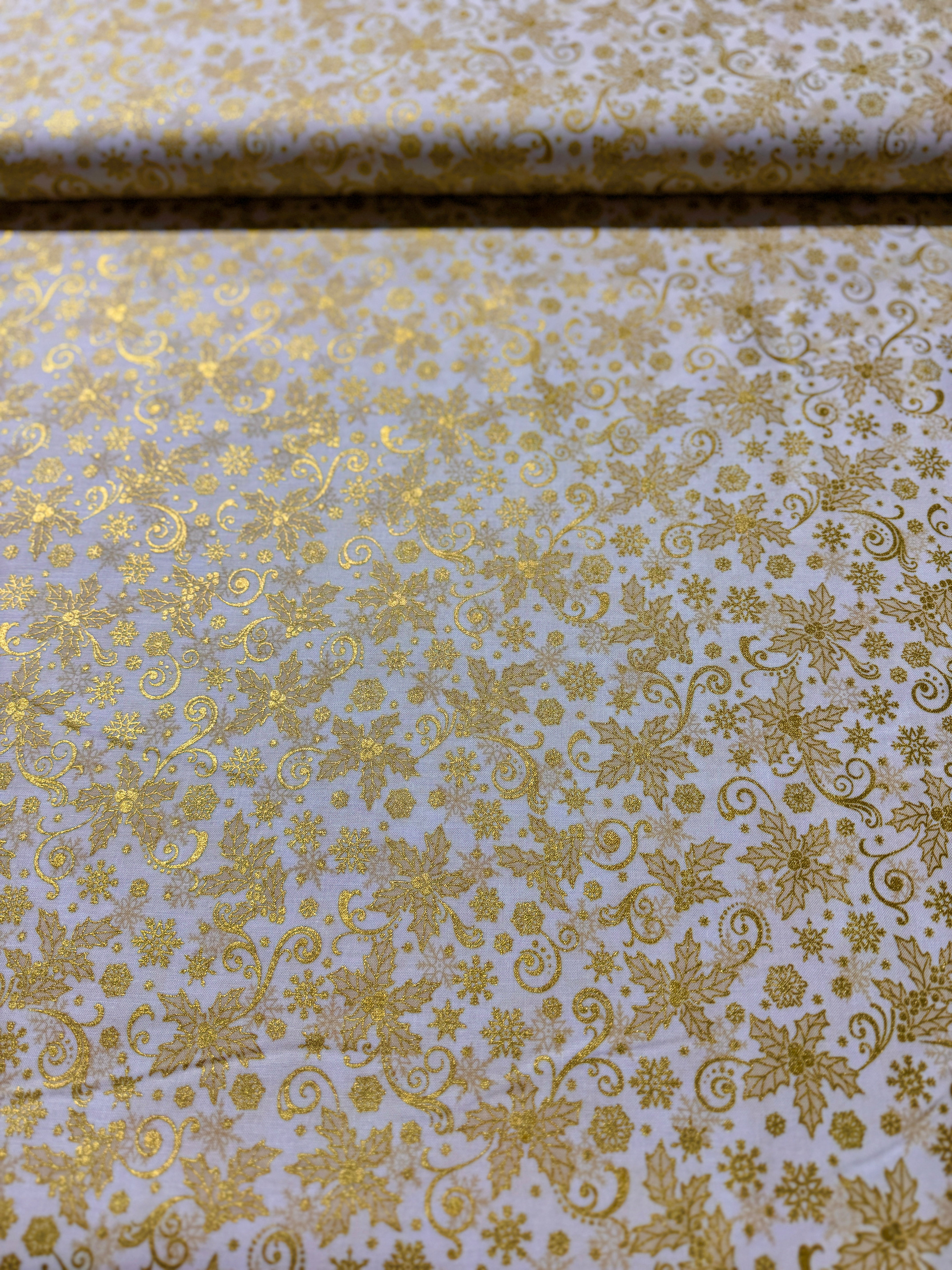 Traditional Trimmings Gold Swirls & Snowflakes on Ivory Fabric by Robert Kaufman – metallic cotton holiday fabric.