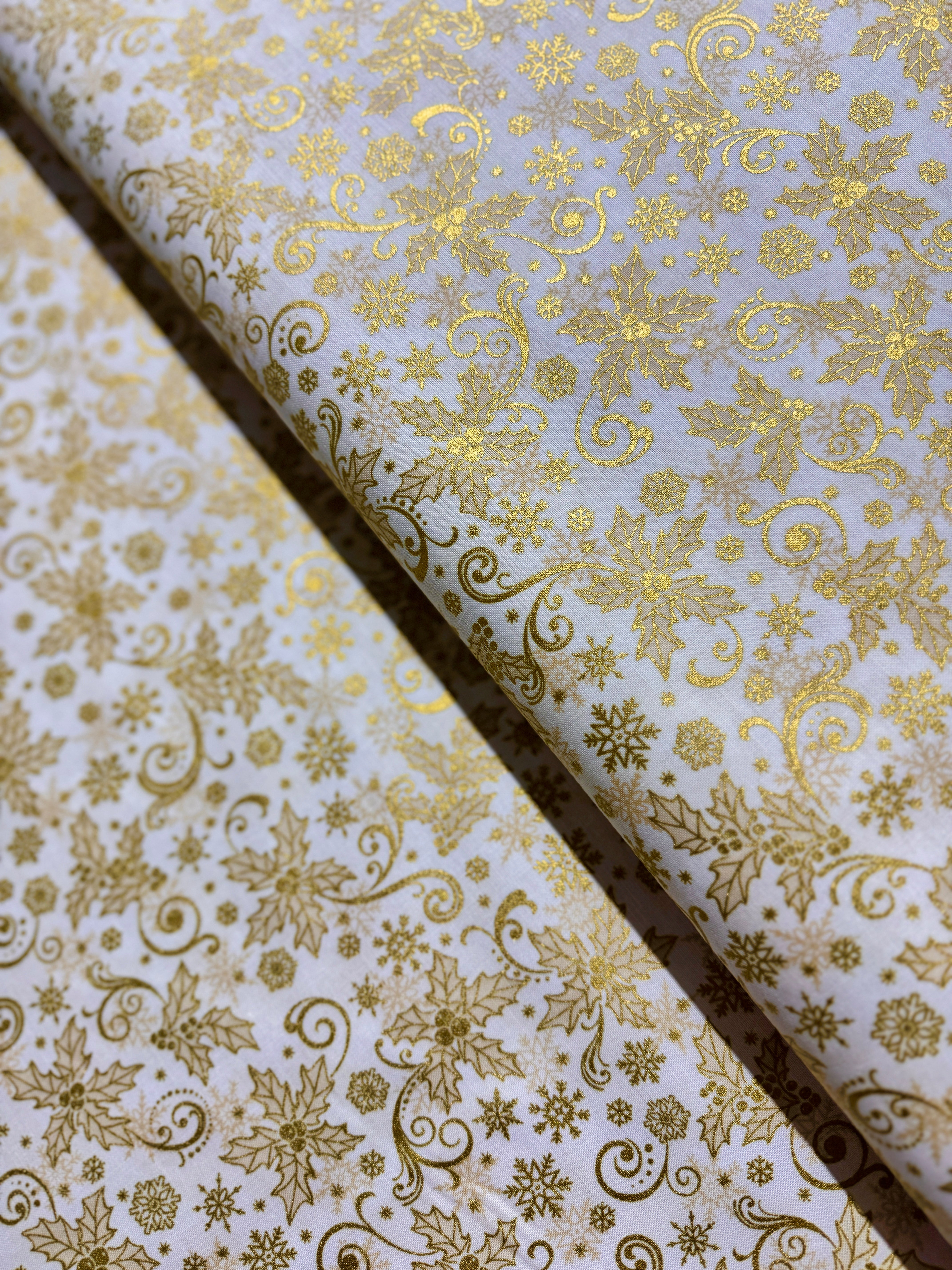 Traditional Trimmings Gold Swirls & Snowflakes on Ivory Fabric by Robert Kaufman – metallic cotton holiday fabric.