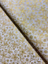 Traditional Trimmings Gold Swirls & Snowflakes on Ivory Fabric by Robert Kaufman – metallic cotton holiday fabric.