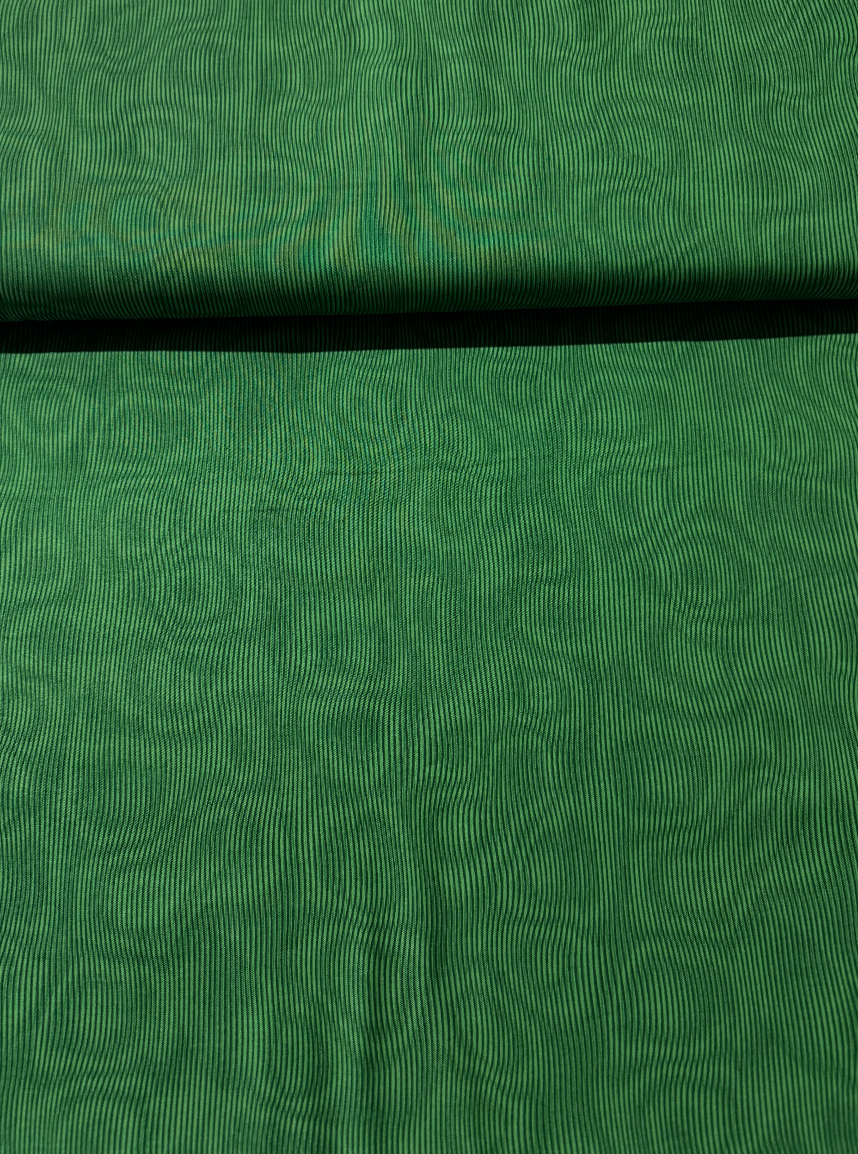 Moire Spruce Fabric by Jinny Beyer for RJR Fabrics – tonal green cotton with subtle moiré texture.