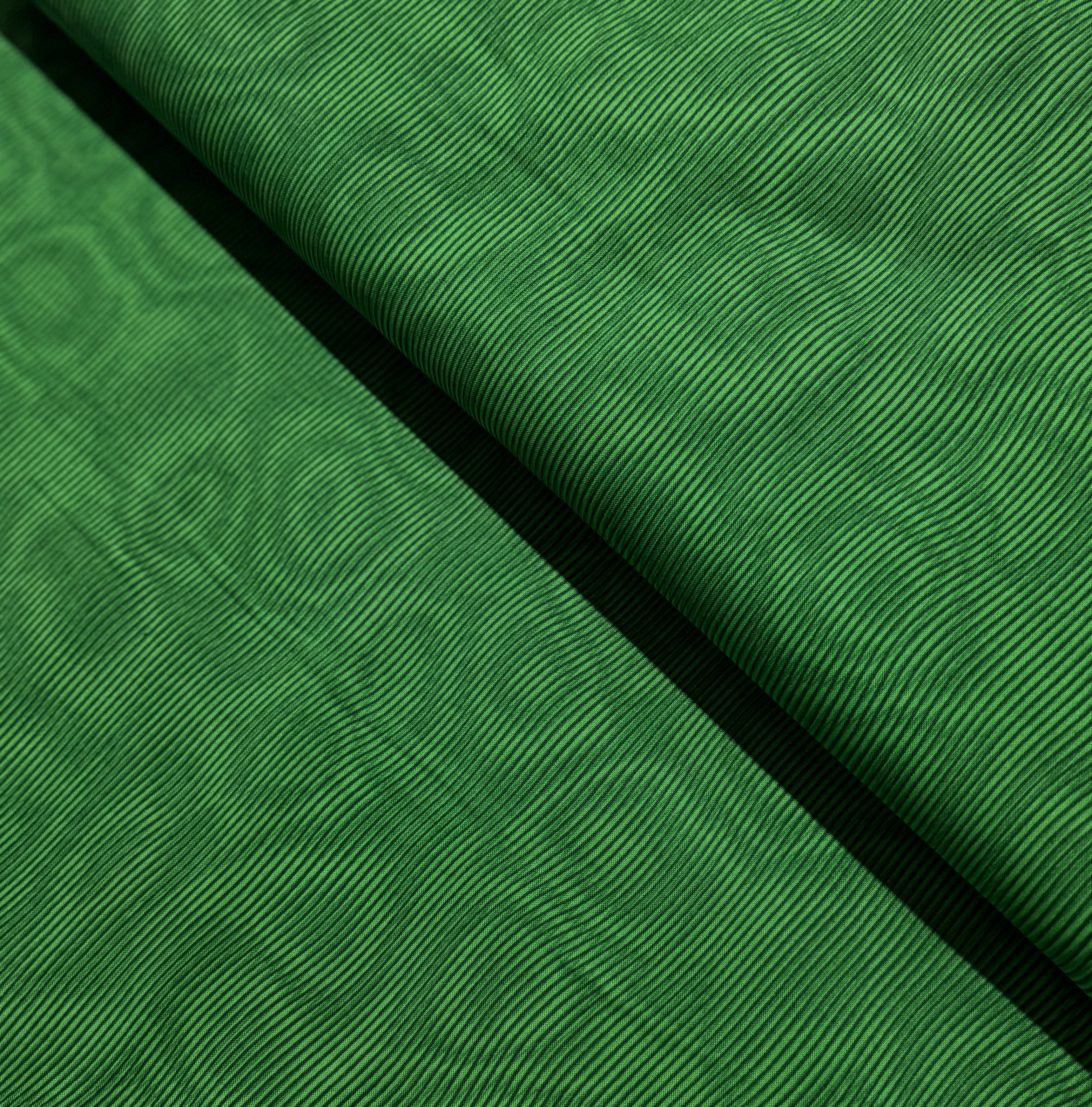 Moire Spruce Fabric by Jinny Beyer for RJR Fabrics – tonal green cotton with subtle moiré texture.
