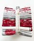 Winter’s Grandeur winter colorstory fat quarter bundle with red, gray, and white holiday quilting cotton fabrics