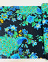 Peacock metallic cotton fabric on black background with gold accents by Timeless Treasures
