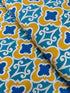 Turquoise lattice geometric cotton fabric with mustard and blue by Dena Designs.