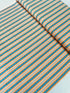 Chambray blue and tan narrow stripe cotton fabric by Patrick Lose for RJR Fabrics.