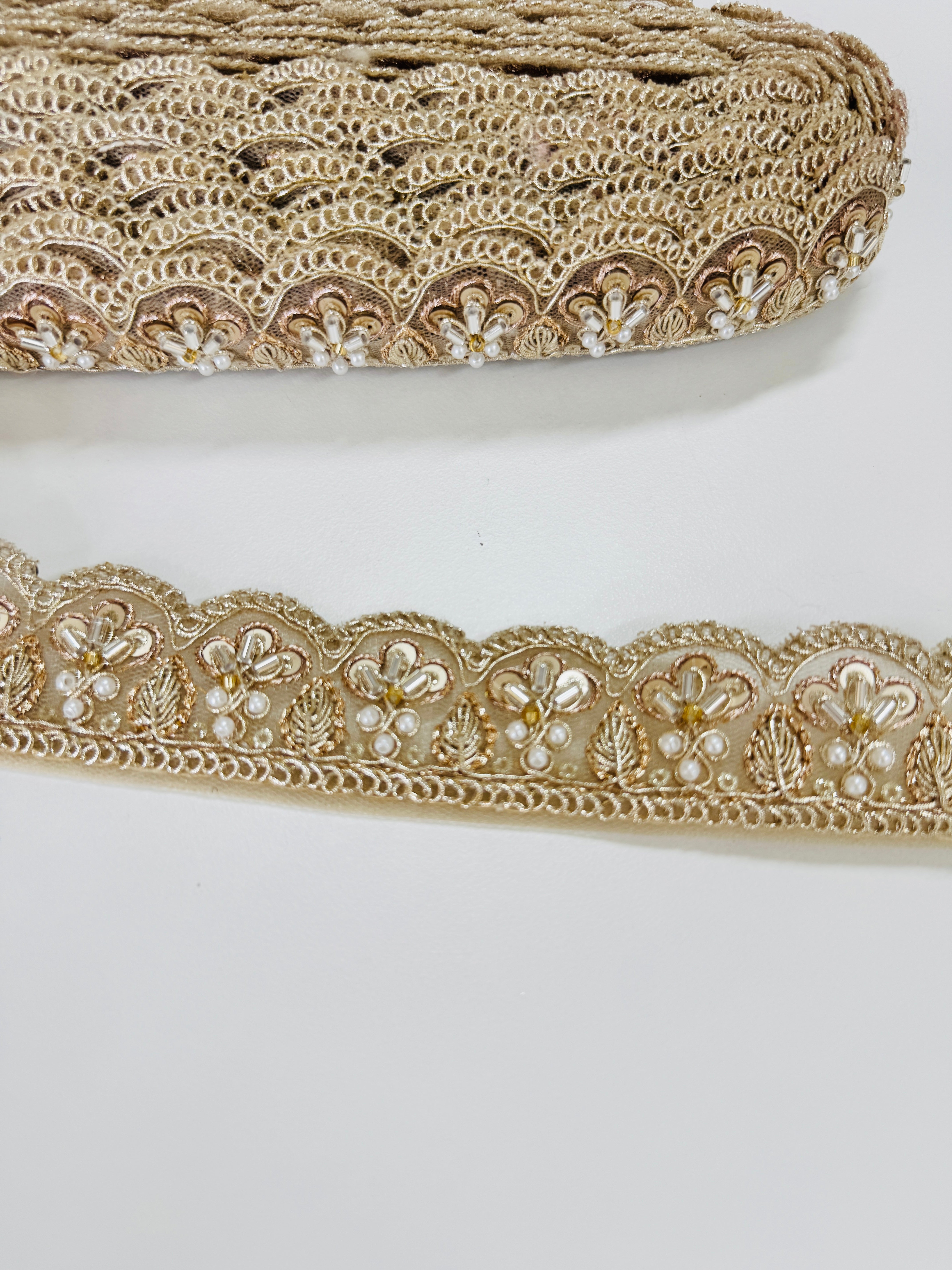 Gold embroidered lace trim with floral beadwork and scalloped edge for garments and crafts