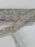 Silver beaded lace trim with sequins, embroidery, and scalloped edge for bridal gowns, veils, lehengas, sarees, couture garments, and sewing projects.