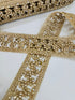 Champagne beaded lace trim with crystal embellishments and embroidered openwork design for bridal gowns, veils, lehengas, sarees, and couture sewing projects.