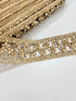 Champagne beaded lace trim with crystal embellishments and embroidered openwork design for bridal gowns, veils, lehengas, sarees, and couture sewing projects.