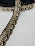 Black and gold beaded scalloped trim with sequins and bugle beads for sarees, lehengas, gowns, veils, and couture sewing projects.