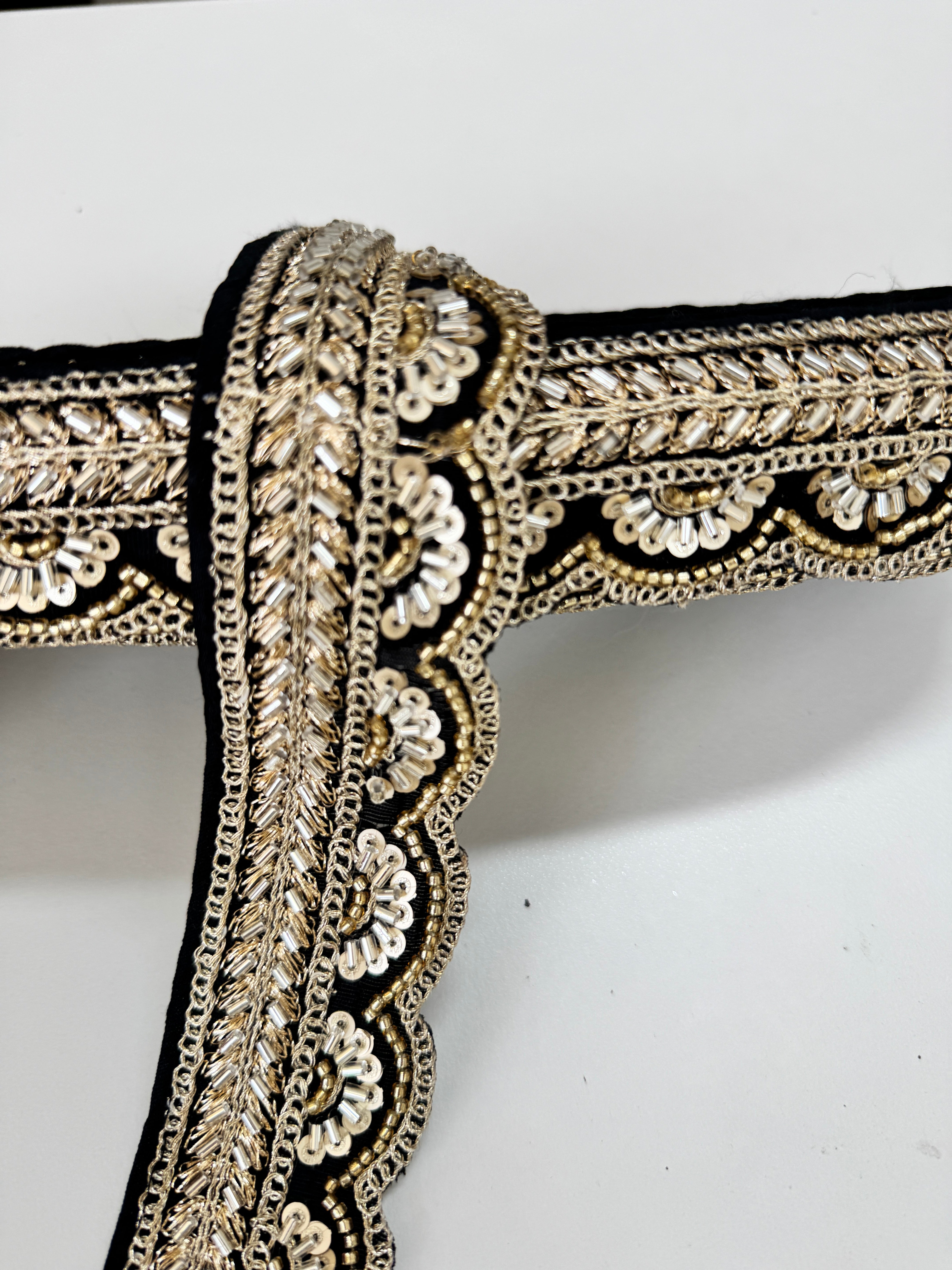 Black and gold beaded scalloped trim with sequins and bugle beads for sarees, lehengas, gowns, veils, and couture sewing projects.