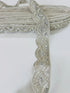 Ivory pearl beaded scalloped lace trim with intricate embroidery, sequins, and pearl embellishments for bridal gowns, veils, sarees, lehengas, christening dresses, and couture sewing projects.