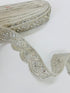 Ivory pearl beaded scalloped lace trim with intricate embroidery, sequins, and pearl embellishments for bridal gowns, veils, sarees, lehengas, christening dresses, and couture sewing projects.