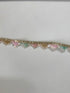 Pastel pink, mint, ivory, and gold beaded sequin trim with metallic edging.
