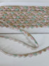 Pastel pink, mint, ivory, and gold beaded sequin trim with metallic edging.