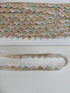 Pastel pink, mint, ivory, and gold beaded sequin trim with metallic edging.