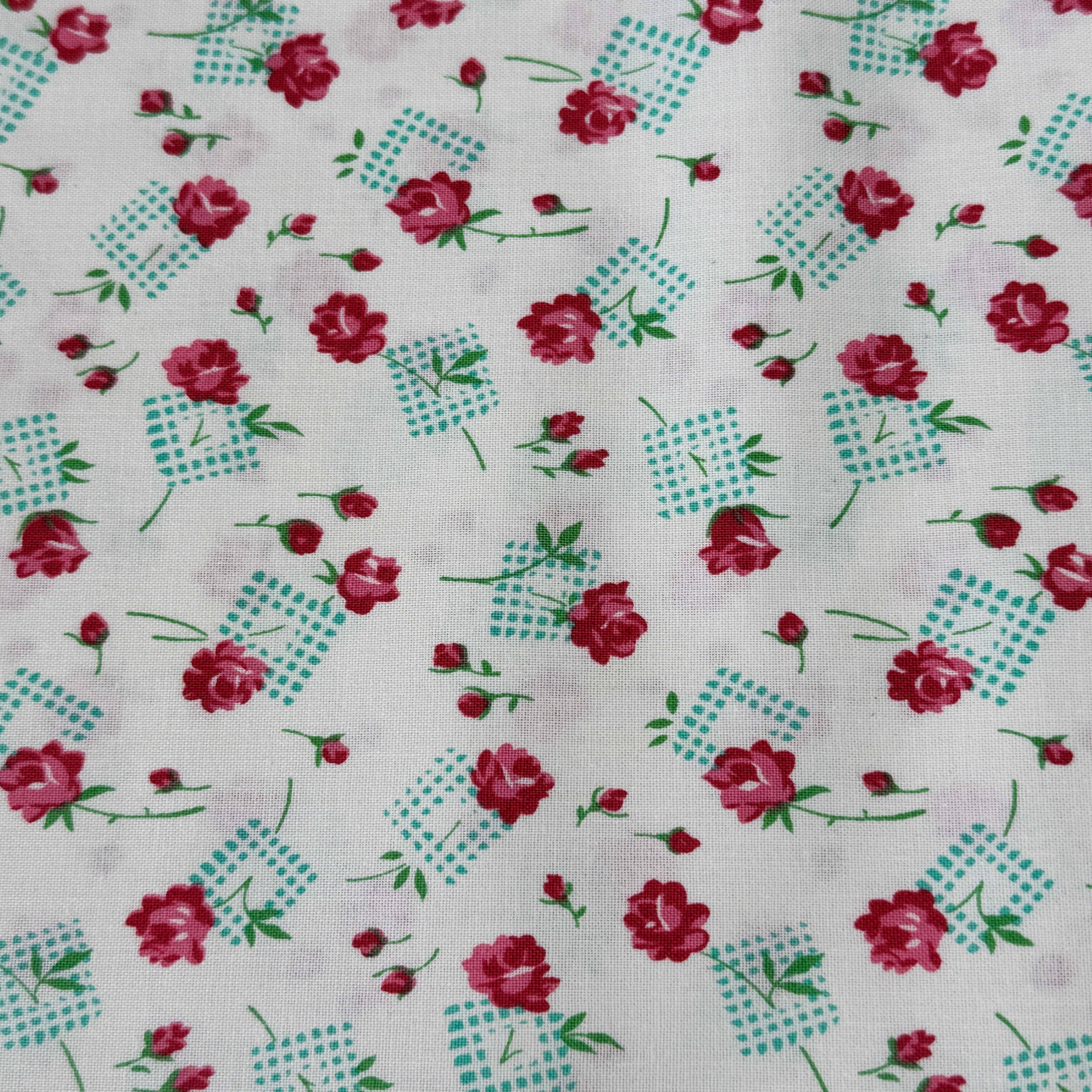 Pink roses and rosebuds with mint gingham accents scattered across a coconut cream background, Sugar Bloom Gingham Garden Coconut cotton fabric.
