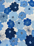 Blue and white flowers with pearlescent shimmer accents scattered across a white background, Packed Shimmer Flower White Pearlescent fabric by Greta Lynn for Kanvas Studio Benartex.