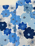 Blue and white flowers with pearlescent shimmer accents scattered across a white background, Packed Shimmer Flower White Pearlescent fabric by Greta Lynn for Kanvas Studio Benartex.
