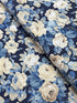 Elegant navy floral cotton fabric with cream roses and soft blue foliage from the Sanderson Vintage Collection by Free Spirit Fabrics.