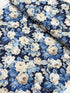 Elegant navy floral cotton fabric with cream roses and soft blue foliage from the Sanderson Vintage Collection by Free Spirit Fabrics.