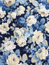 Elegant navy floral cotton fabric with cream roses and soft blue foliage from the Sanderson Vintage Collection by Free Spirit Fabrics.