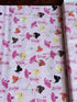 Pink cotton fabric featuring tossed ballerinas, tutus, ballet shoes, and silver glitter accents by Timeless Treasures.