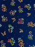 Navy cotton fabric featuring delicate floral blossoms and butterflies scattered throughout, from the Japanese Garden collection by Maywood Studio.