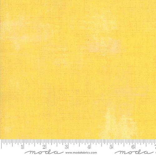Grunge Basics Chiffon premium quilting cotton featuring a soft buttery yellow textured grunge design by BasicGrey for Moda Fabrics.