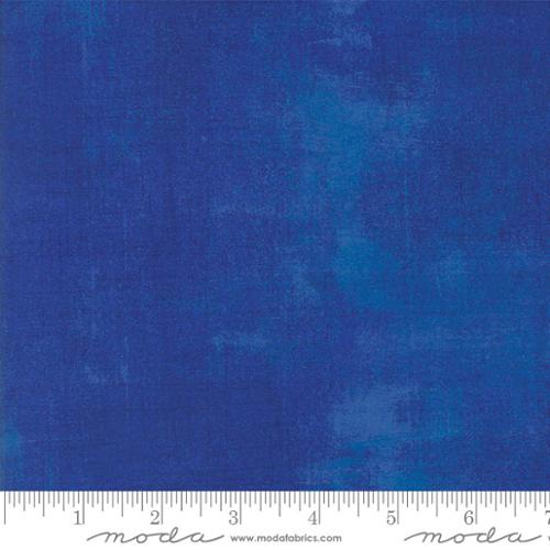 Grunge Surf The Web quilting cotton featuring a vibrant royal blue textured blender design by BasicGrey for Moda Fabrics.
