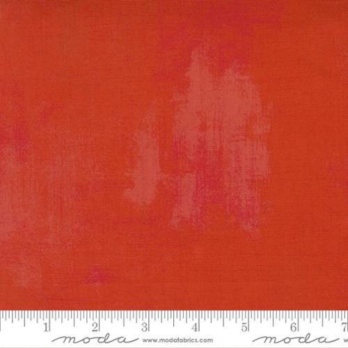 Grunge Basics Melon fabric by BasicGrey for Moda Fabrics featuring a rich melon orange textured grunge design on premium quilting cotton.