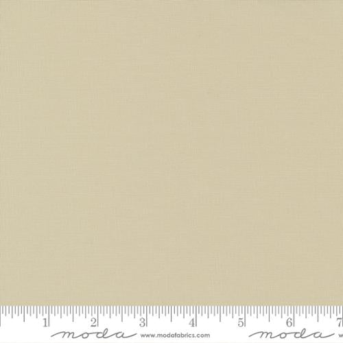 Bella Solids Linen premium quilting cotton by Moda Fabrics featuring a soft warm linen-inspired beige solid, ideal for quilt backgrounds, borders, and coordinating projects.